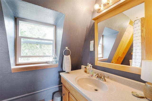 143 Juniper Rd, Black Hawk, CO 80422 - bathroom with vanity, a textured wall, and toilet