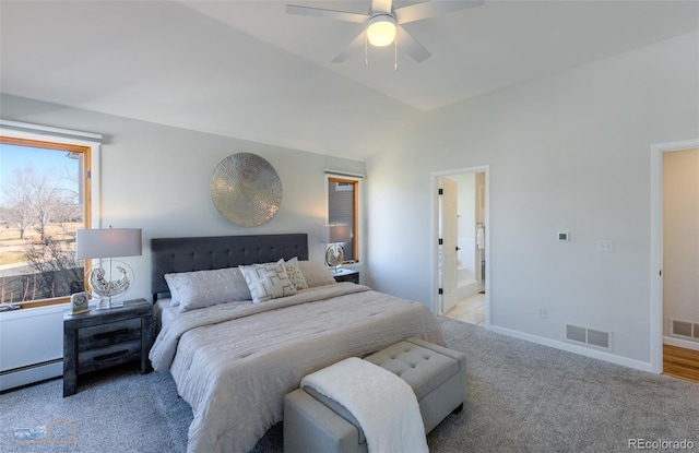 2425 Waneka Lake Trl, Lafayette, CO 80026 - bedroom with light carpet, vaulted ceiling, a ceiling fan, baseboards, and baseboard heating