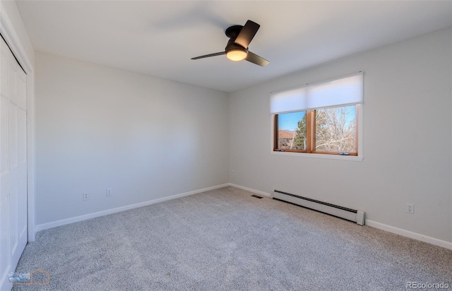 2425 Waneka Lake Trl, Lafayette, CO 80026 - unfurnished bedroom featuring a baseboard radiator, carpet floors, a closet, and baseboards