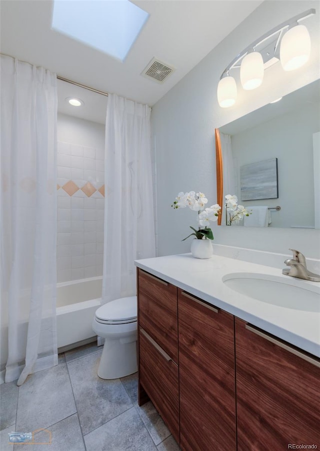 2425 Waneka Lake Trl, Lafayette, CO 80026 - full bathroom featuring vanity, shower / bath combo with shower curtain, toilet, tile patterned floors, and recessed lighting