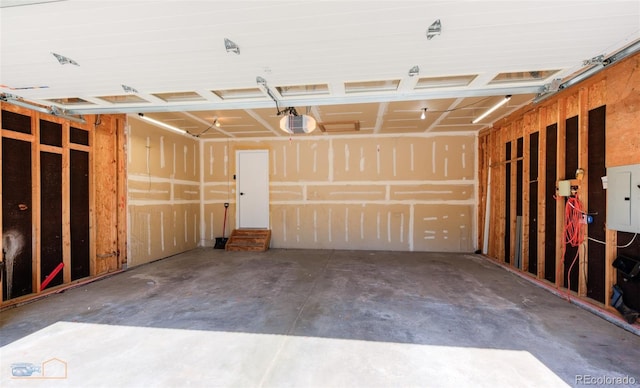 2425 Waneka Lake Trl, Lafayette, CO 80026 - garage featuring electric panel and a garage door opener
