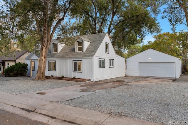 view of front of property with an outbuilding and a garage