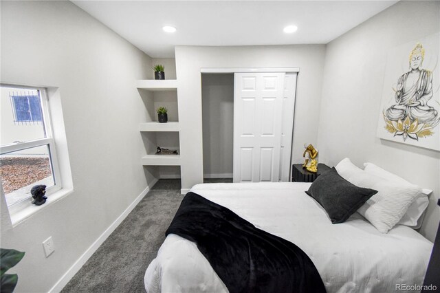 carpeted bedroom with a closet