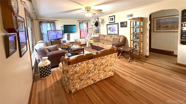 200 W 5th St, Julesburg, CO 80737 - living area featuring wood finished floors, baseboards, and a ceiling fan