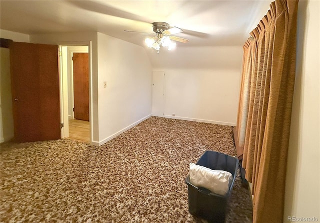 200 W 5th St, Julesburg, CO 80737 - empty room with carpet, ceiling fan, lofted ceiling, and baseboards