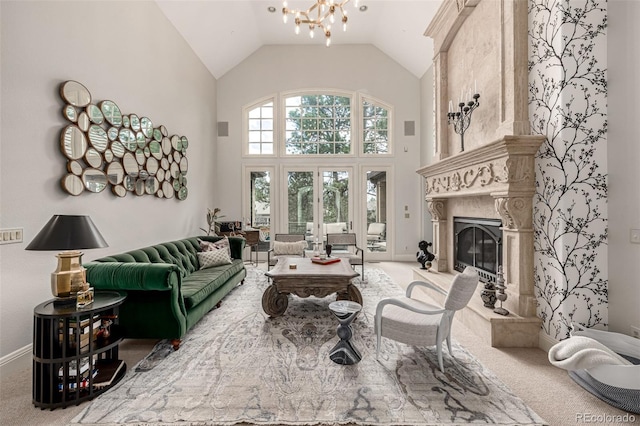 648 Ruby Trust Dr, Castle Rock, CO 80108 - living area with carpet flooring, high vaulted ceiling, a premium fireplace, and a chandelier