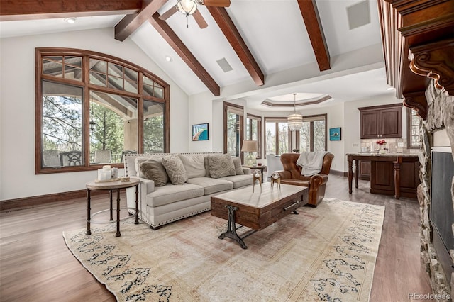 648 Ruby Trust Dr, Castle Rock, CO 80108 - living room with light wood finished floors, baseboards, and ceiling fan