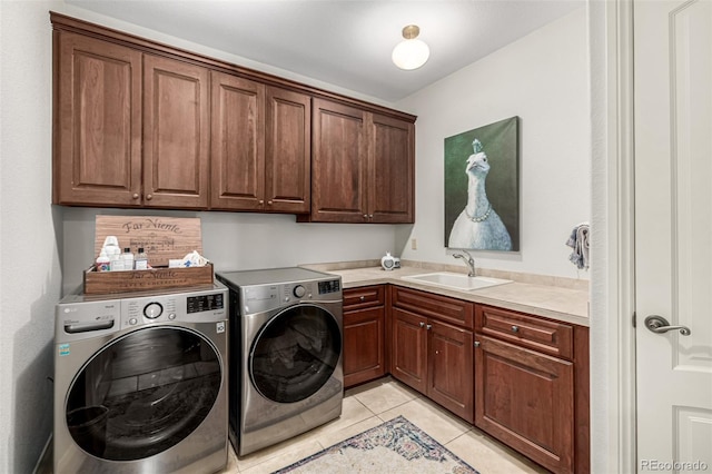 648 Ruby Trust Dr, Castle Rock, CO 80108 - laundry area featuring cabinet space, washer and dryer, and light tile patterned floors