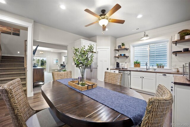 20243 High Pines Dr, Monument, CO 80132 - dining area featuring a ceiling fan, stairway, recessed lighting, and light wood-type flooring