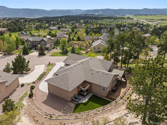 20243 High Pines Dr, Monument, CO 80132 - aerial view of residential area with a mountain backdrop