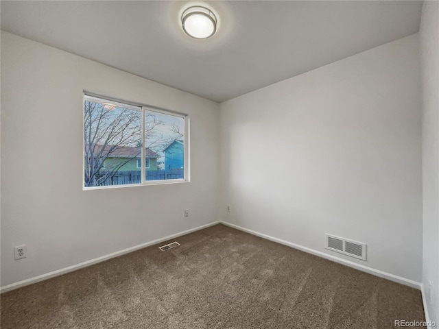 3913 Roosevelt Ave, Wellington, CO 80549 - spare room with dark colored carpet