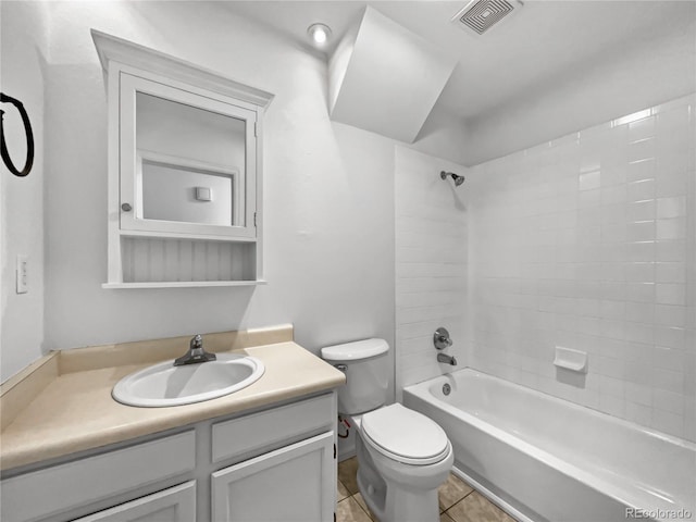 3913 Roosevelt Ave, Wellington, CO 80549 - full bathroom featuring tiled shower / bath combo, vanity, tile patterned flooring, and toilet