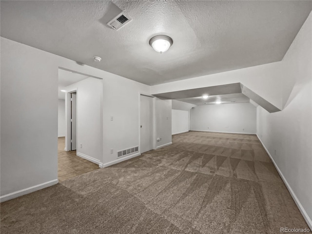 3913 Roosevelt Ave, Wellington, CO 80549 - bonus room featuring a textured ceiling and carpet flooring