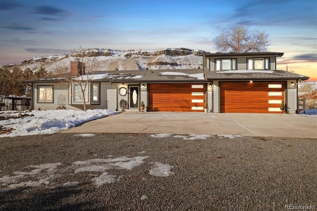 view of front of house with a mountain view