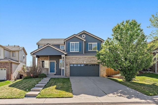 2404 S Genoa Way, Aurora, CO 80013 - view of front of property with concrete driveway, brick siding, a front lawn, and an attached garage