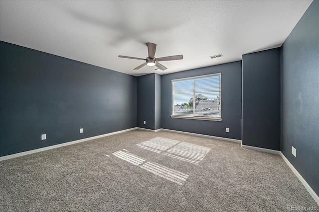 2404 S Genoa Way, Aurora, CO 80013 - carpeted spare room with ceiling fan, a textured ceiling, and baseboards
