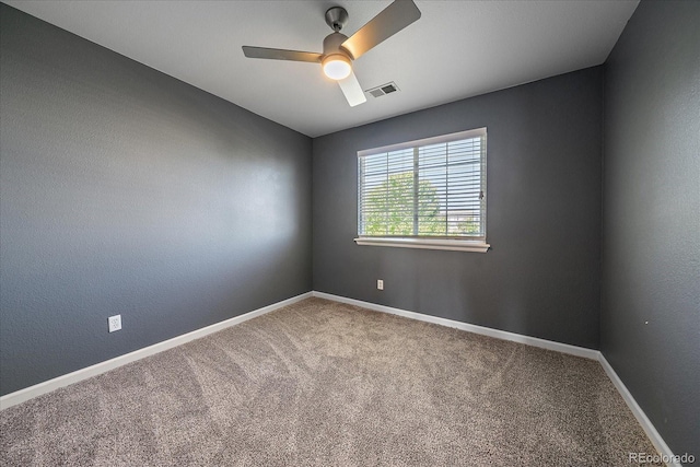 2404 S Genoa Way, Aurora, CO 80013 - carpeted spare room with a ceiling fan and baseboards