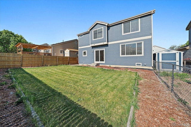2404 S Genoa Way, Aurora, CO 80013 - rear view of house featuring a storage shed