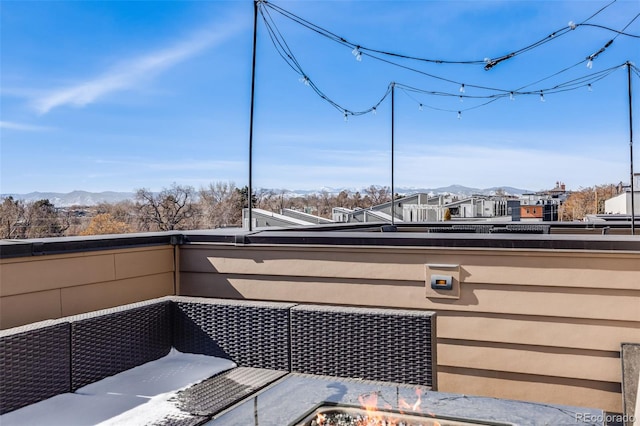 balcony with a mountain view and a residential view