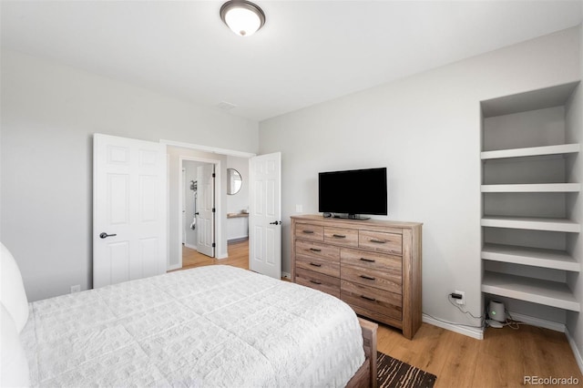 17378 W 78th Dr, Arvada, CO 80007 - bedroom with wood finished floors