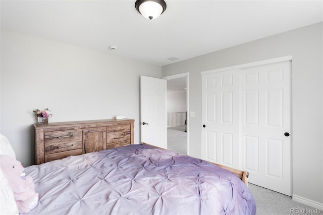 17378 W 78th Dr, Arvada, CO 80007 - bedroom with carpet, a closet, and baseboards