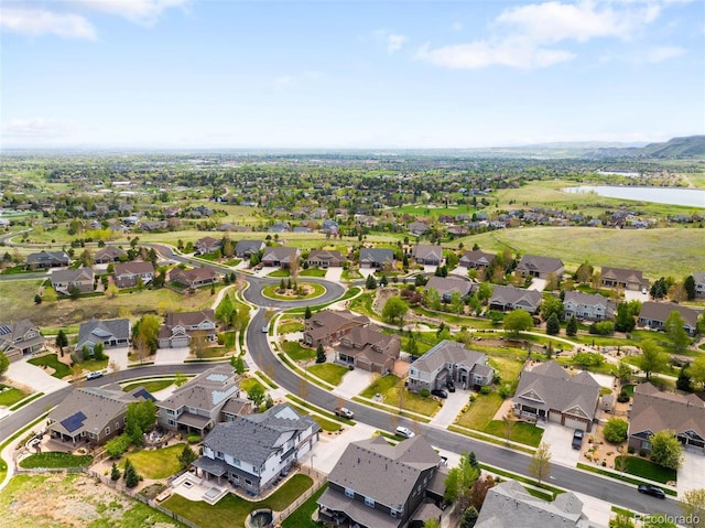 17378 W 78th Dr, Arvada, CO 80007 - aerial view of property and surrounding area with a large body of water and nearby suburban area