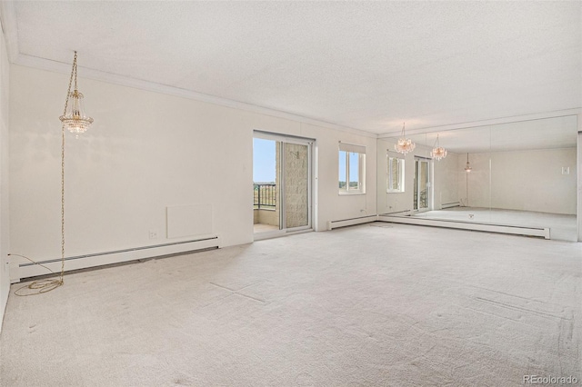 13800 E Marina Dr Unit 601, Aurora, CO 80014 - carpeted empty room with baseboard heating, ornamental molding, and a textured ceiling