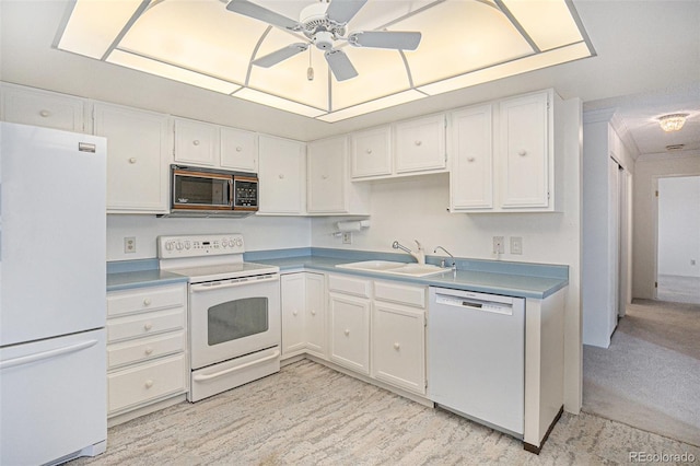 13800 E Marina Dr Unit 601, Aurora, CO 80014 - kitchen featuring white appliances, white cabinetry, a ceiling fan, and light countertops