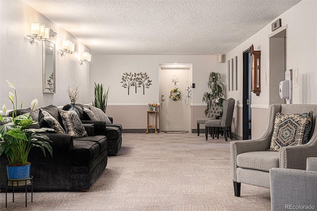 13800 E Marina Dr Unit 601, Aurora, CO 80014 - living area featuring a textured ceiling and carpet floors