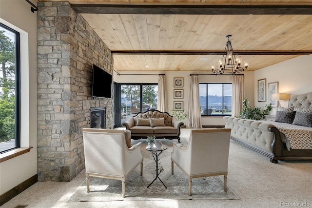 living room with light carpet, wooden ceiling, and a wealth of natural light