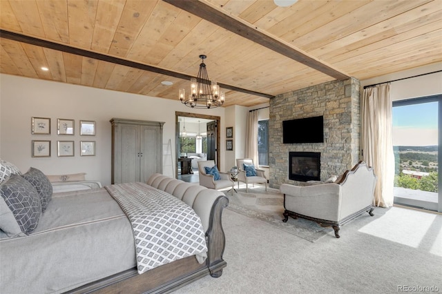 carpeted bedroom with an inviting chandelier, wood ceiling, beamed ceiling, and a fireplace