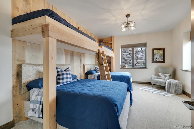 bedroom featuring light carpet