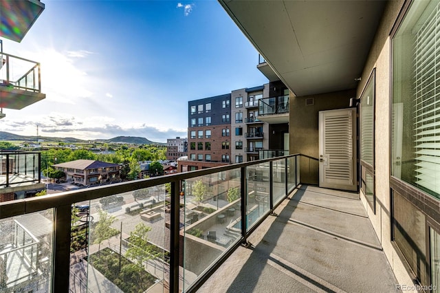 balcony featuring a mountain view