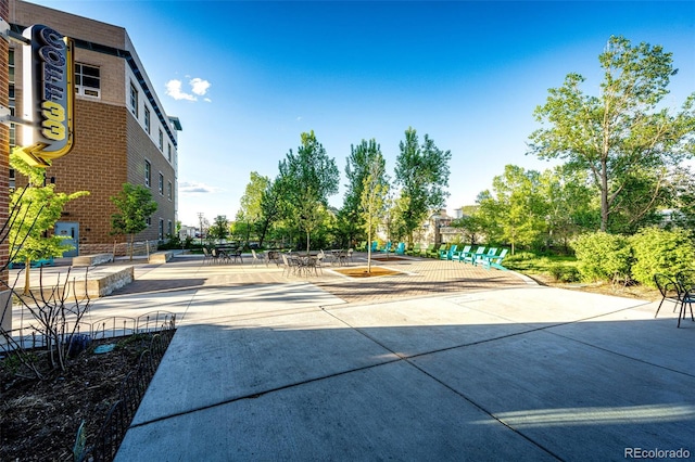 view of property's community with a patio