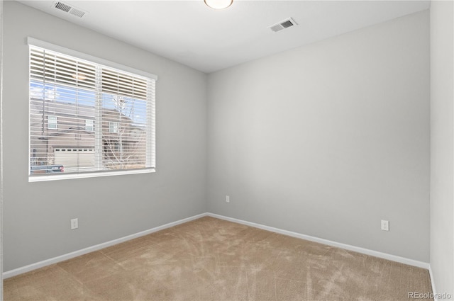 9883 Truckee St, Commerce City, CO 80022 - carpeted spare room with visible vents and baseboards