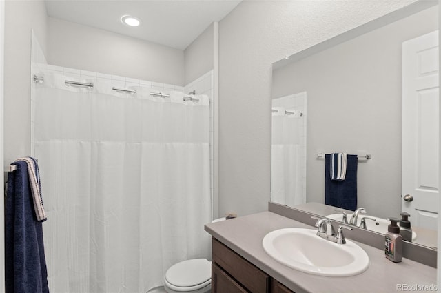 9883 Truckee St, Commerce City, CO 80022 - bathroom featuring toilet, vanity, and a shower with curtain