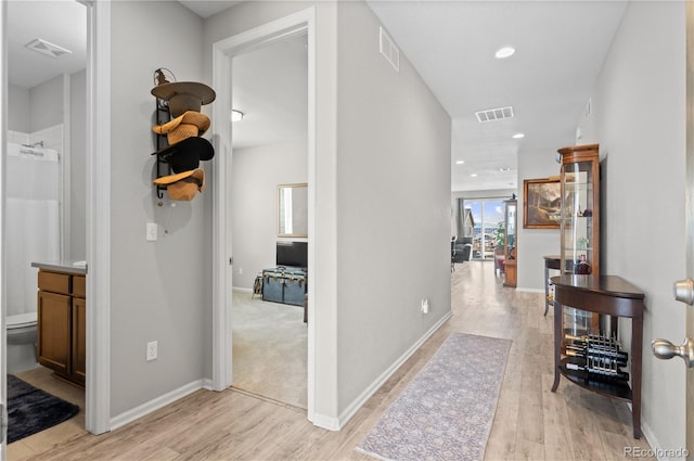 9883 Truckee St, Commerce City, CO 80022 - hallway featuring recessed lighting, light wood finished floors, and visible vents