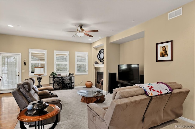8582 E 148th Ln, Thornton, CO 80602 - living area with a ceiling fan, a fireplace, and recessed lighting