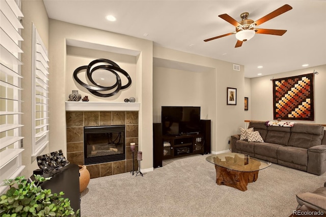 8582 E 148th Ln, Thornton, CO 80602 - carpeted living room with a ceiling fan, recessed lighting, and a tiled fireplace