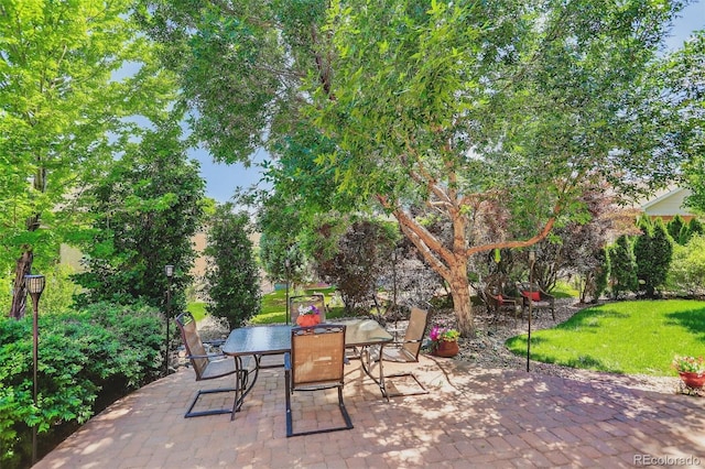 8582 E 148th Ln, Thornton, CO 80602 - view of patio / terrace with outdoor dining area