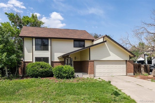 7231 Eaton Cir, Arvada, CO 80003 - view of front of home featuring brick siding, an attached garage, driveway, and a front lawn