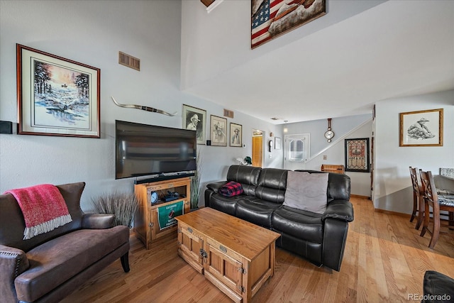 living room featuring light wood-type flooring