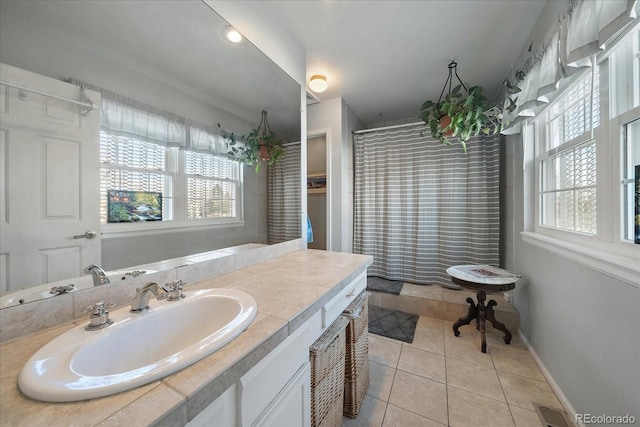 bathroom featuring vanity and tile patterned flooring