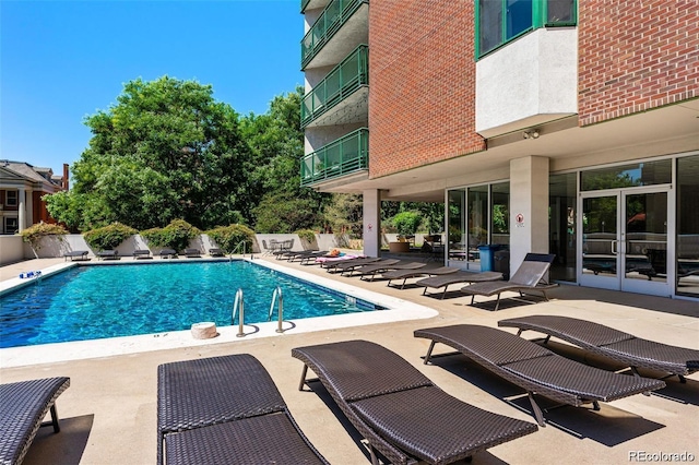550 E 12th Ave Unit 209, Denver, CO 80203 - community pool with a patio area