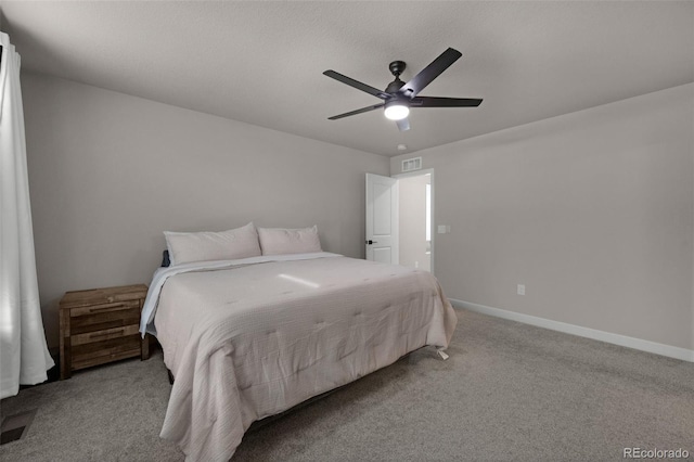 bedroom featuring ceiling fan and light colored carpet