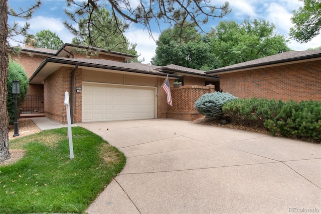 view of front of house with a garage