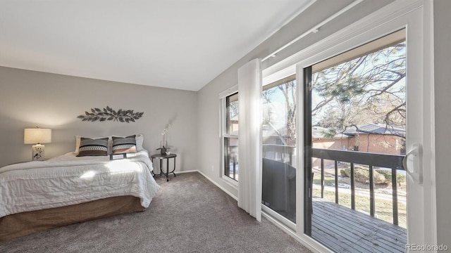 carpeted bedroom featuring access to outside