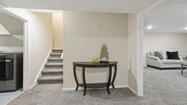 stairs with carpet and washer / dryer