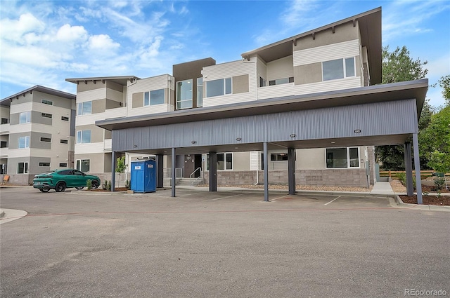 1304 Snowberry Unit 103, Louisville, CO 80027 - view of property with covered parking