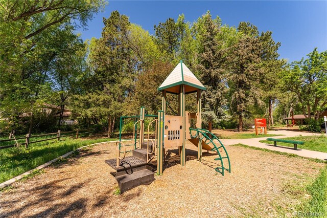 1528 N Chestnut St, Colorado Springs, CO 80907 - community play area with view of wooded area